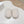 MULES ATTACHED TRIANGLE LOGO IN WHITE SHEARLING