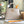 CAPUCINES BB 27 DARK BEIGE TAURILLON GOLD HARDWARE