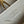 CAPUCINES BB 27 DARK BEIGE TAURILLON GOLD HARDWARE