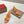 CL 25 Cross-Strap Slippers Orange Gloss Calf Patent Leather Rivets 314924