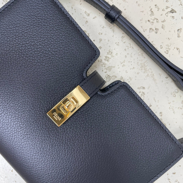 MINI POCHETTE CON 18 TRACOLLE IN PELLE DI VITELLO MORBIDA NERA