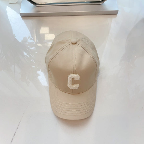 Cappello Celin in tessuto di cotone bianco avorio 210387
