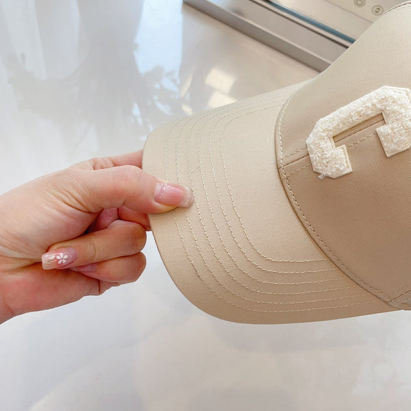 Cappello Celin in tessuto di cotone bianco avorio 210387