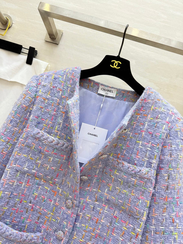 Manteau mi-long en tweed de laine violet Chanel 2025 Tissu 319534