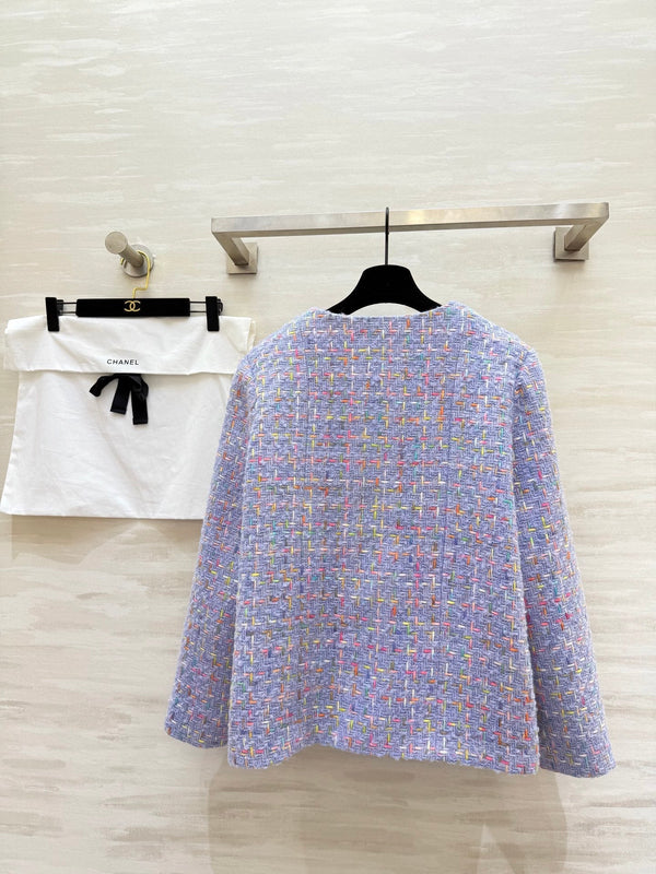 Manteau mi-long en tweed de laine violet Chanel 2025 Tissu 319534