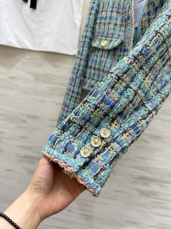 Manteau en tweed de laine bleu-vert col en V Chanel 2025 319506