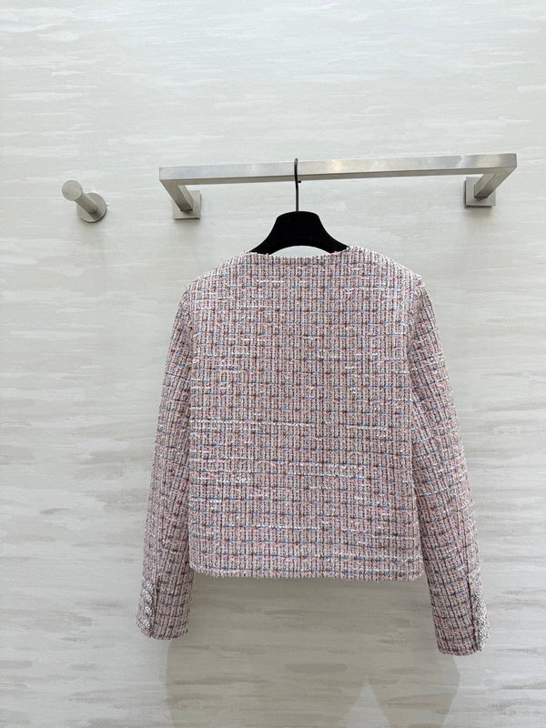 Veste Chanel 2025 à chaîne strassée en tweed rose 319510