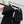 Chanel 2025 Jupe deux pièces en tissu tweed tressé noir, boucle dorée 319481