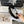 BLACK FABRIC HAIRBAND WITH PEARL CHAIN 412528