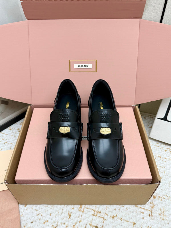 Miu Vintage-Effect Penny Loafers Black Leather 791004