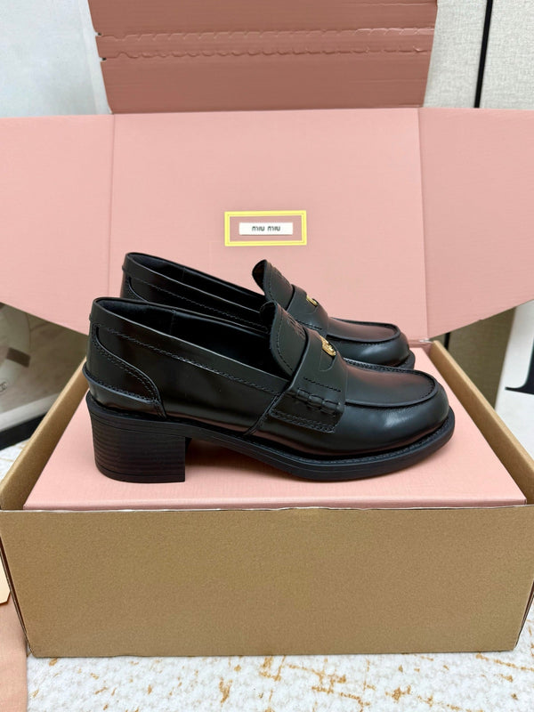 Miu Vintage-Effect Penny Loafers Black Leather 791004
