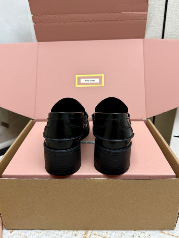 Miu Vintage-Effect Penny Loafers Black Leather 791004