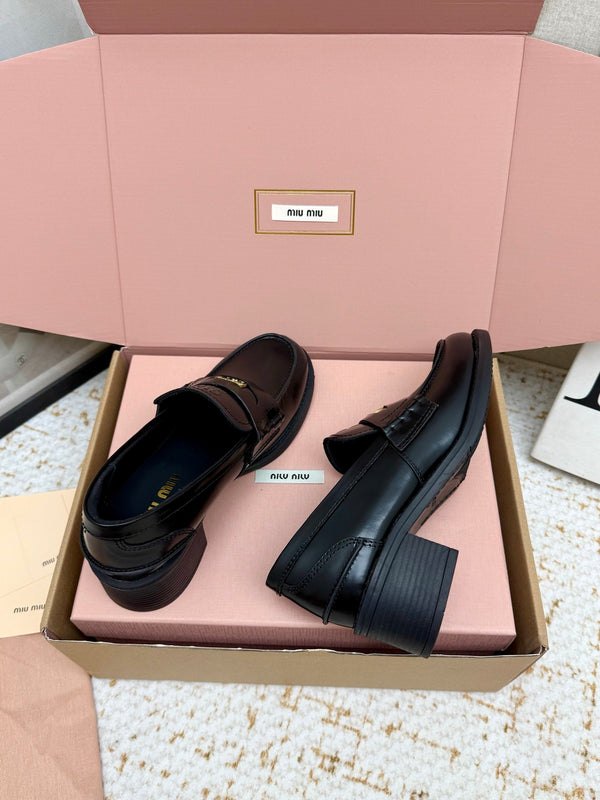 Miu Vintage-Effect Penny Loafers Black Leather 791004