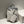 HERBAG A DOS ZIP RETOURNE BACKPACK 29 IN OFF-WHITE CANVAS AND BLACK CALFSKIN