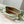 capucines mini 21 green beige taurillon leather gold hardware