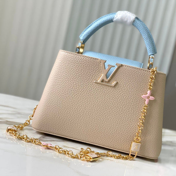 capucines bb 27 beige blu nuvola pelle taurillon hardware dorato
