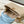 capucines bb 27 beige blu nuvola pelle taurillon hardware dorato