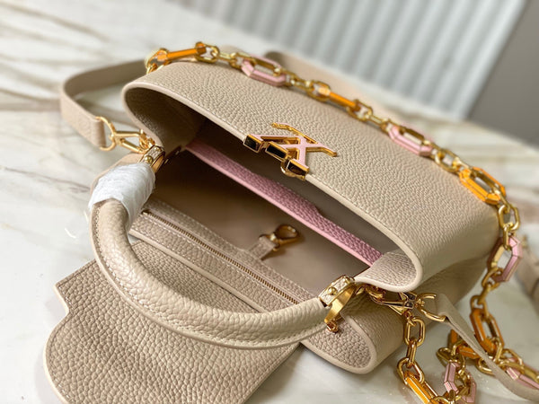 CAPUCINES BB 27CM PELLE TAURILLON BEIGE