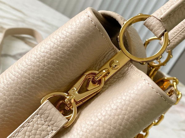 CAPUCINES BB 27CM PELLE TAURILLON BEIGE