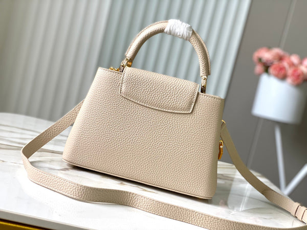 CAPUCINES BB 27CM PELLE TAURILLON BEIGE