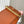 CAPUCINES GM 38CM BROWN ORANGE TAURILLON LEATHER