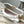 CAPUCINES BB 27 IN WHITE TAURILLON GOLD HARDWARE