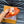 LV SLIPPERS IN CARROT ORANGE MONOGRAM CALFSKIN