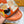 LV SLIPPERS IN CARROT ORANGE MONOGRAM CALFSKIN