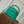 CAPUCINES MINI 21 GREEN CROCODILE EMBOSSED CALFSKIN GOLD HARDWARE