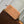 BELLA 22 IN CINNAMON BROWN MONOGRAM PERFORATED SUEDE AND WHITE SHEARLING TRIM