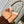 CARRYALL PM 29 IN CIDER BROWN MONOGRAM PERFORATED SUEDE AND WHITE SHEARLING TRIM