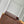 GASTON WEARABLE WALLET 18 IN BROWN MONOGRAM CANVAS MIX RED CALFSKIN
