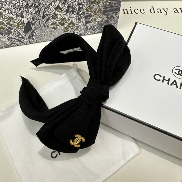 BLACK FABRIC HEADBAND WITH BOW 168569