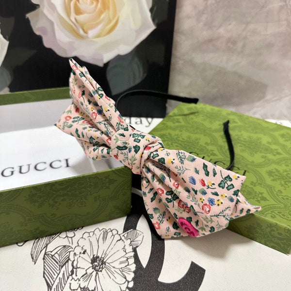 CERCHIETTO IN TESSUTO FLOREALE ROSA CHIARO 385853