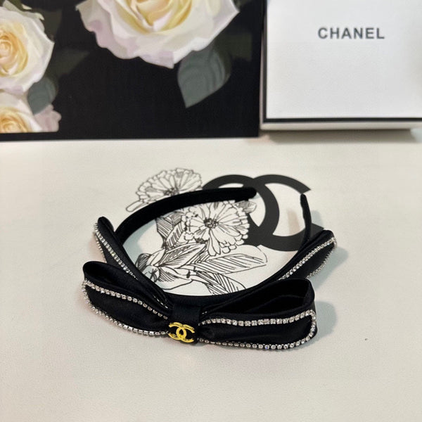 CERCHIETTO IN TESSUTO NERO CON CRISTALLI 412465