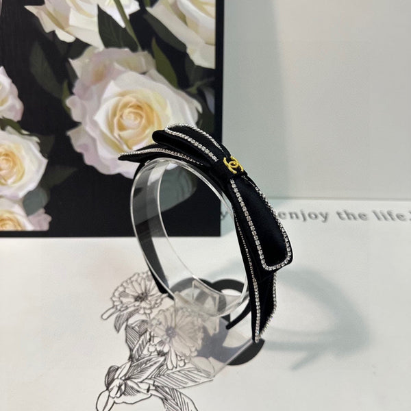 CERCHIETTO IN TESSUTO NERO CON CRISTALLI 412465