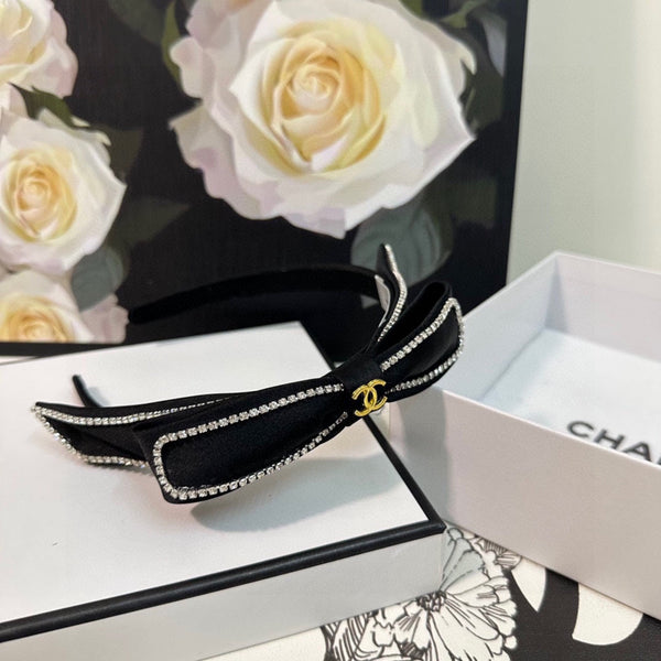 CERCHIETTO IN TESSUTO NERO CON CRISTALLI 412465