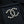 DOUBLE C LETTER BROOCH IN GOLD METAL WITH CRYSTALS AROUND LOGO