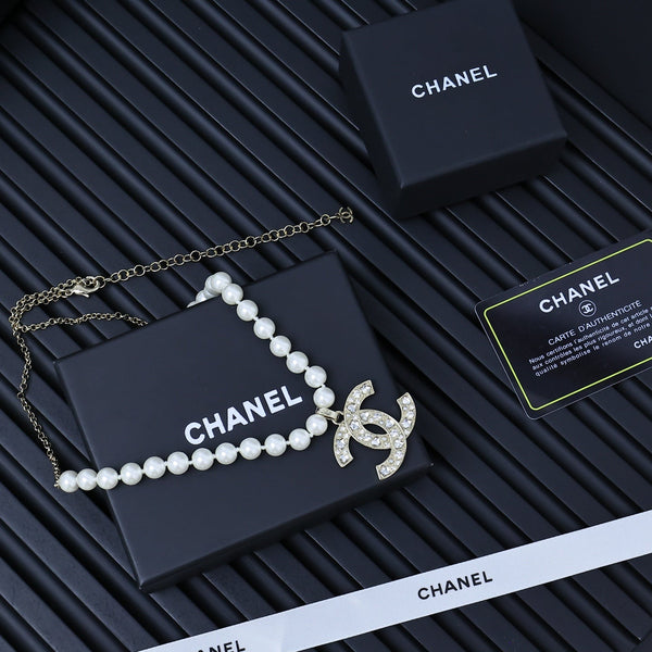 25P PEARL NECKLACE IN LIGHT GOLD STAR & HEART DOUBLE C PENDANT