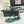 SL CRYSTAL T-STRAP FLAT SANDAL DARK GREEN SATIN