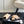 pantofole imbottite incrociate in tessuto lycra beige nero