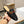 GG Mule da uomo con motivo GG intrecciato in pelle di vacchetta nera 111485