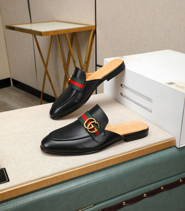 GG Mule da uomo con motivo GG intrecciato in pelle di vacchetta nera 111485