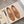 Mocassino con nappine da uomo GG in pelle scamosciata marrone chiaro 440168