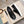 Slip-on da uomo GG in pelle di vitello goffrata nera 518844