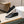 Slip-on da uomo GG in pelle di vitello goffrata nera 518844