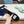 PRA SAFFIANO PATENT SLIDES MOTIVO STRUZZO PELLE DI VITELLO SEAFOAM