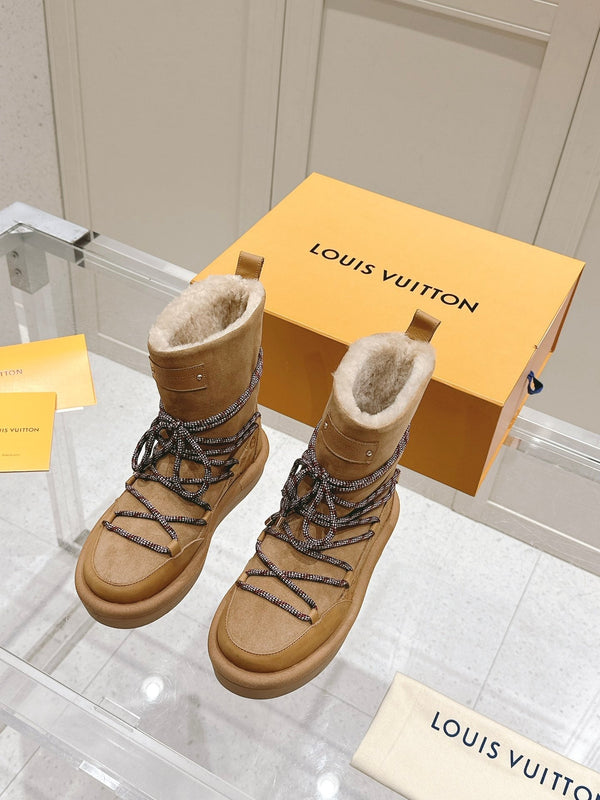 STIVALETTO CON PLATEAU ASPEN IN CAMOSCIO E SHEARLING CON MONOGRAMMA MARRONE SIDRO