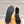 STIVALETTO CON PLATEAU ASPEN IN CAMOSCIO E SHEARLING CON MONOGRAMMA NERO