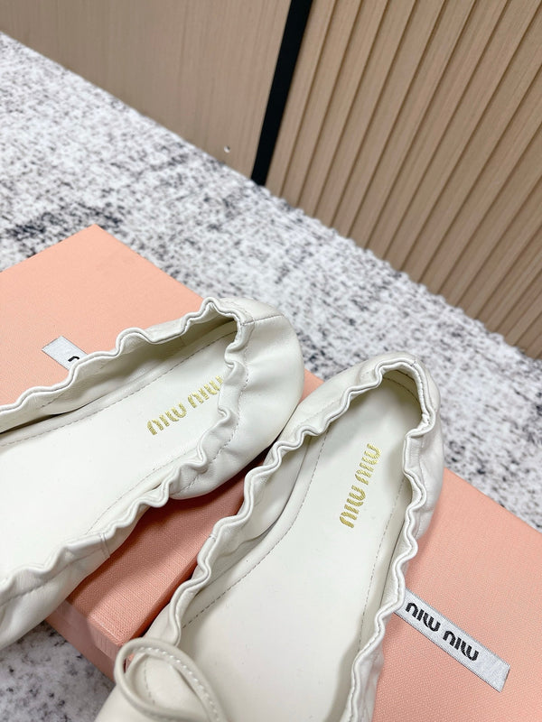Miu Mary Jane plat en peau de mouton blanche 591573